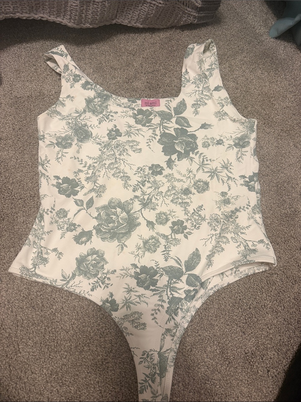 Francesca's White Bodysuit with Sage Floral Print